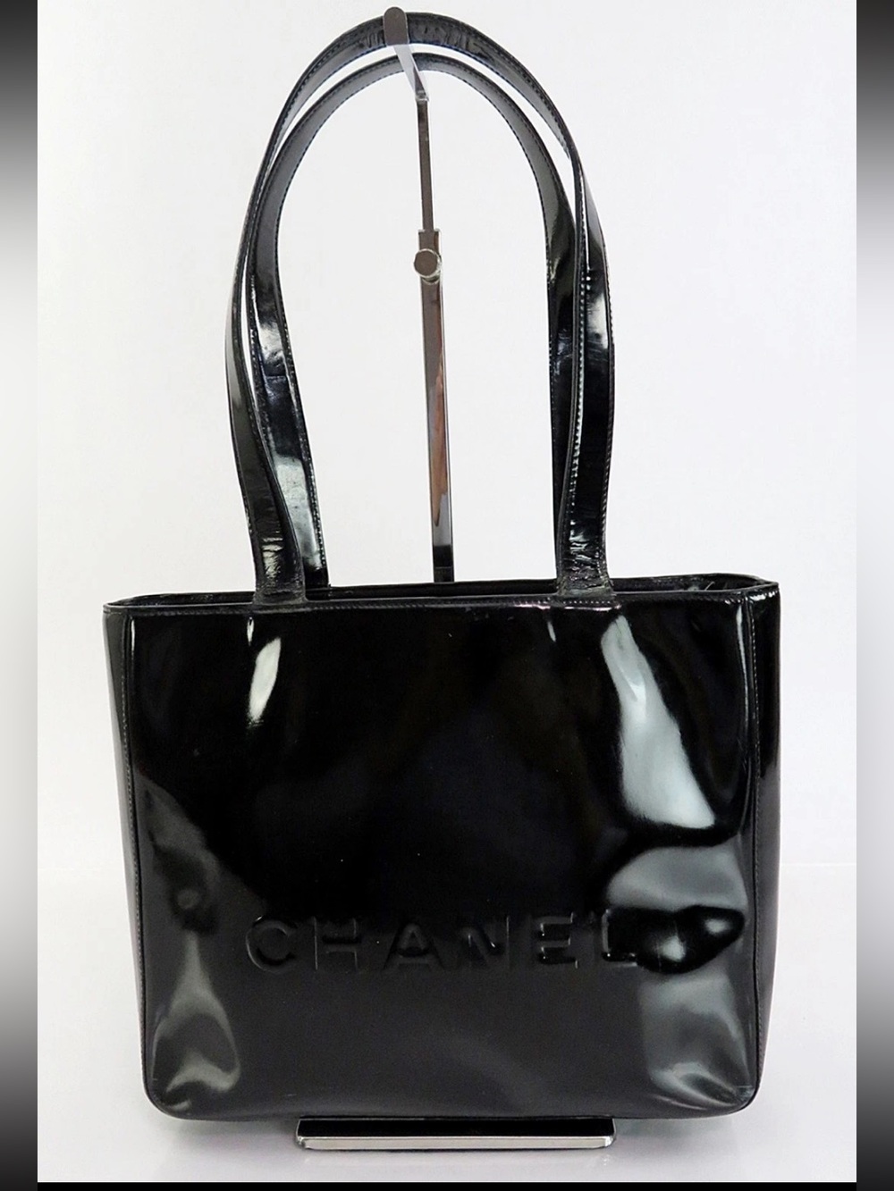 CHANEL Black Patent Tote with Embossed Logo